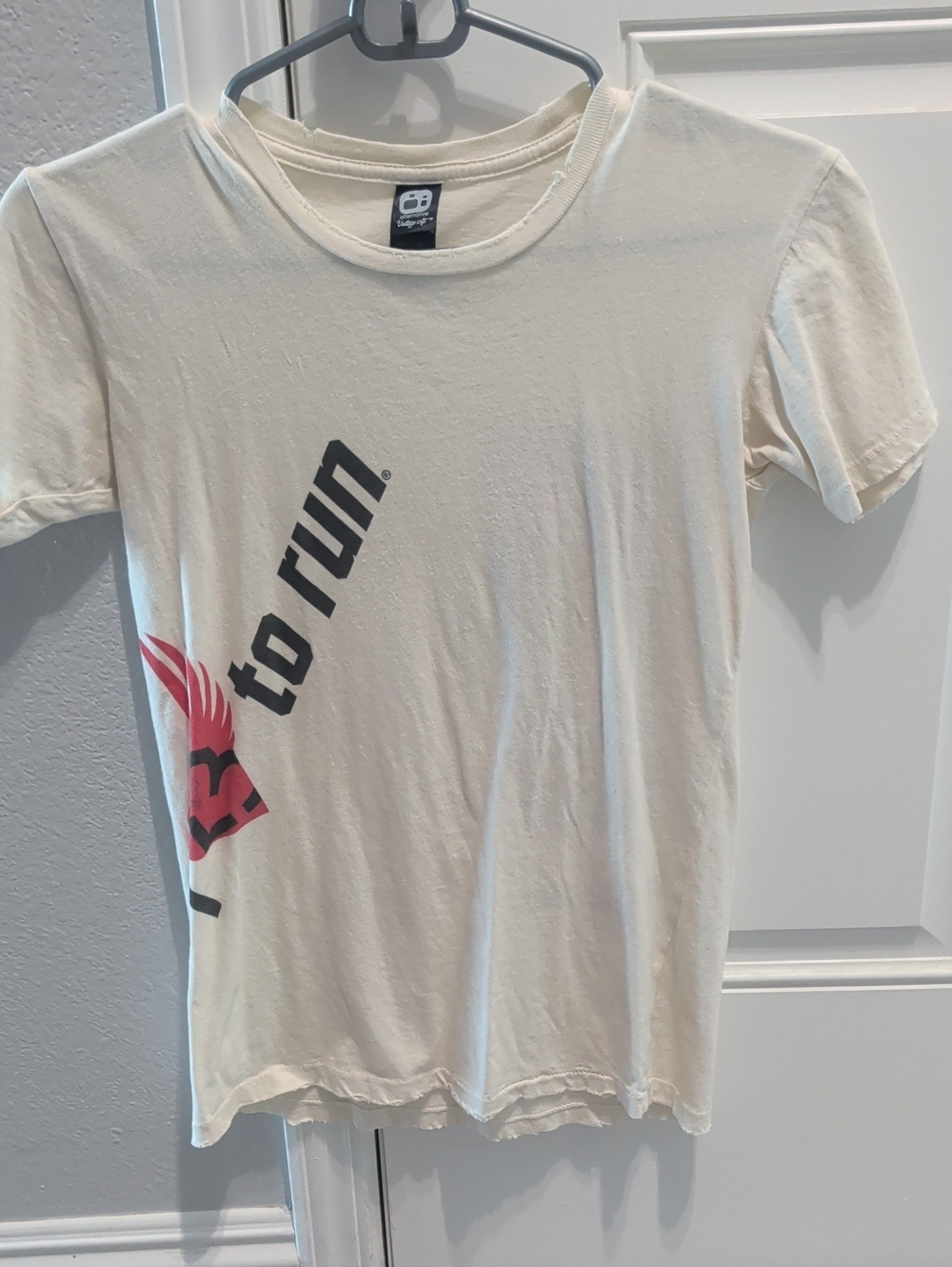 To Run Graphic Tee. Cream with Red Accent